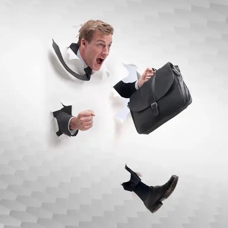 Jumping man with suitcase